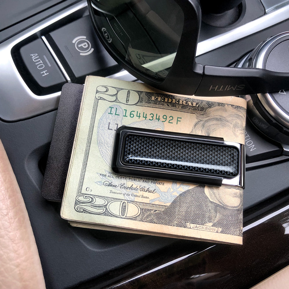 Black anodized money clip in pocket