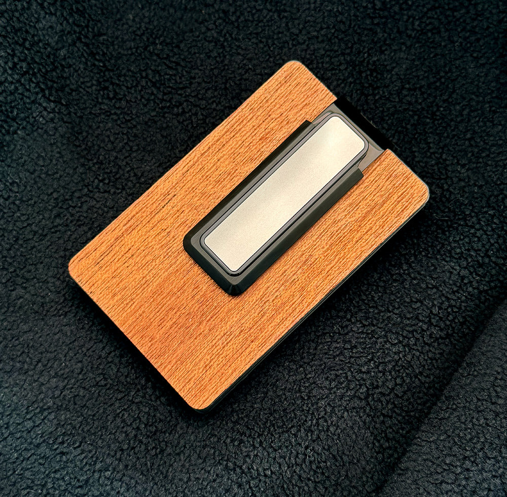 Black and silver sandblasted money clip comparison